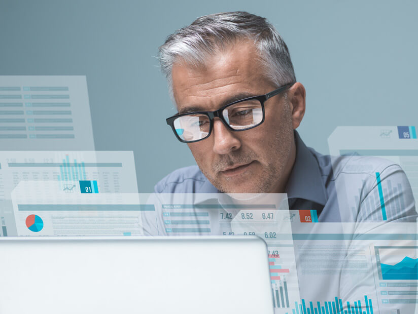 businessman reading financial reports