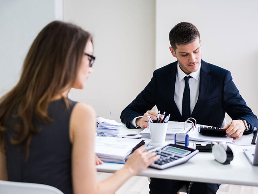 Chapter 04 - The Changing Faces of Finance Transformation 9 two finance professionals calculating statement