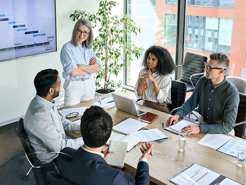 Chapter 05 - Upskilling & Reskilling in the Age of AI 9 woman cfo leading team meeting
