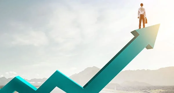 CFO Hub 8 growth concept with executive standing on arrow pointing up 1