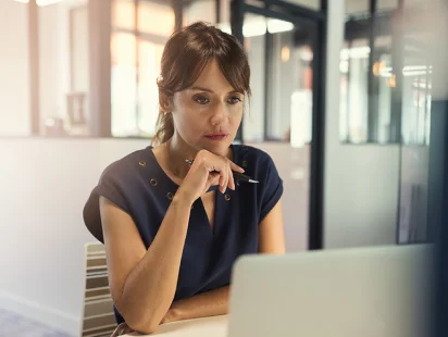 Fractional CFO and Strategic Advisory Services | Paro.ai 18 Woman-at-computer-creates-growth-strategy