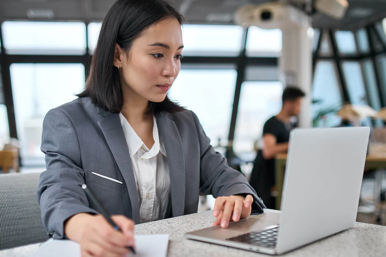 woman-with-laptop-plans-business-tax
