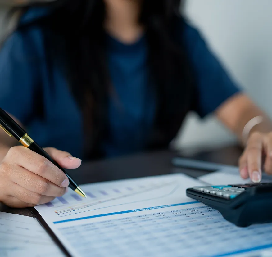 woman-at-desk-reviews-financials