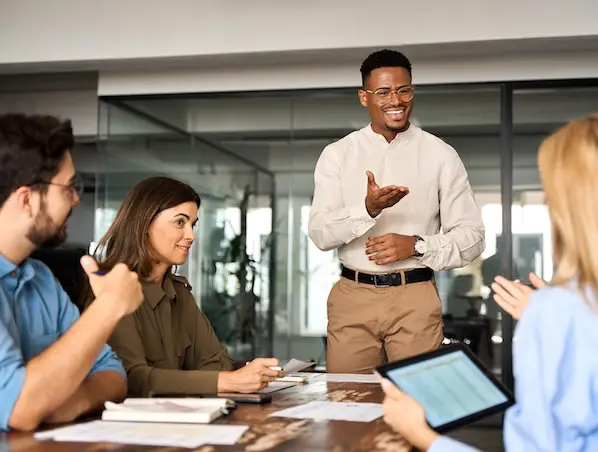 Finance leader presenting at a team meeting