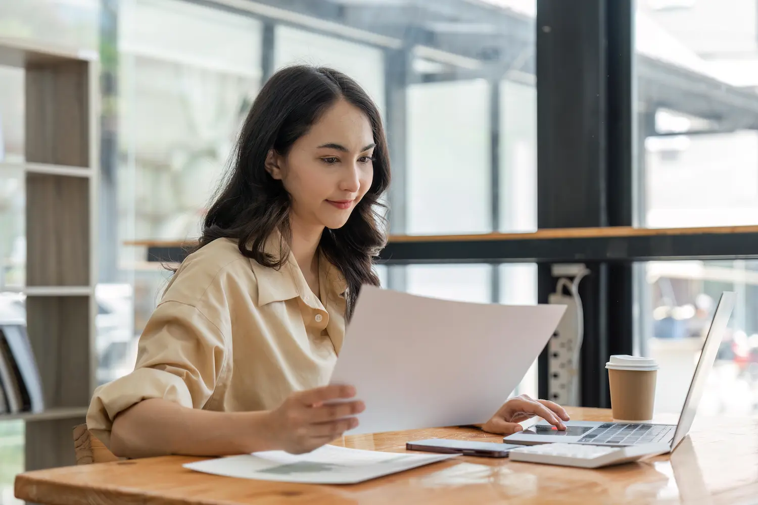 A business owner reviews her tax planning strategy